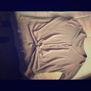 Gray tunic with tie in front.